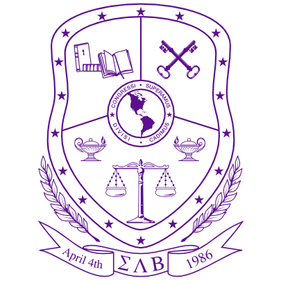 The Sigma Lambda Beta seal depicting books, keys, oil lamps, and balancing scales. The center has a map silhouette of the Americas wrapped with the words Congressi, Superamius, Divisi, and Cadmius. A banner beneath the crest reads April  4, 1986 wrapped around the associated greek letters.