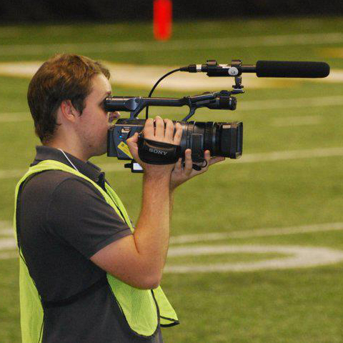 Good ol' Ilya Pinchuk with a camera on the field at the Kibbie Dome