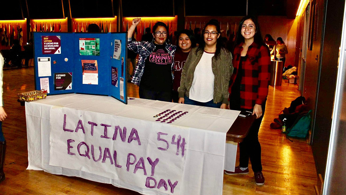 A table set up as part of Latina Equal Pay Day