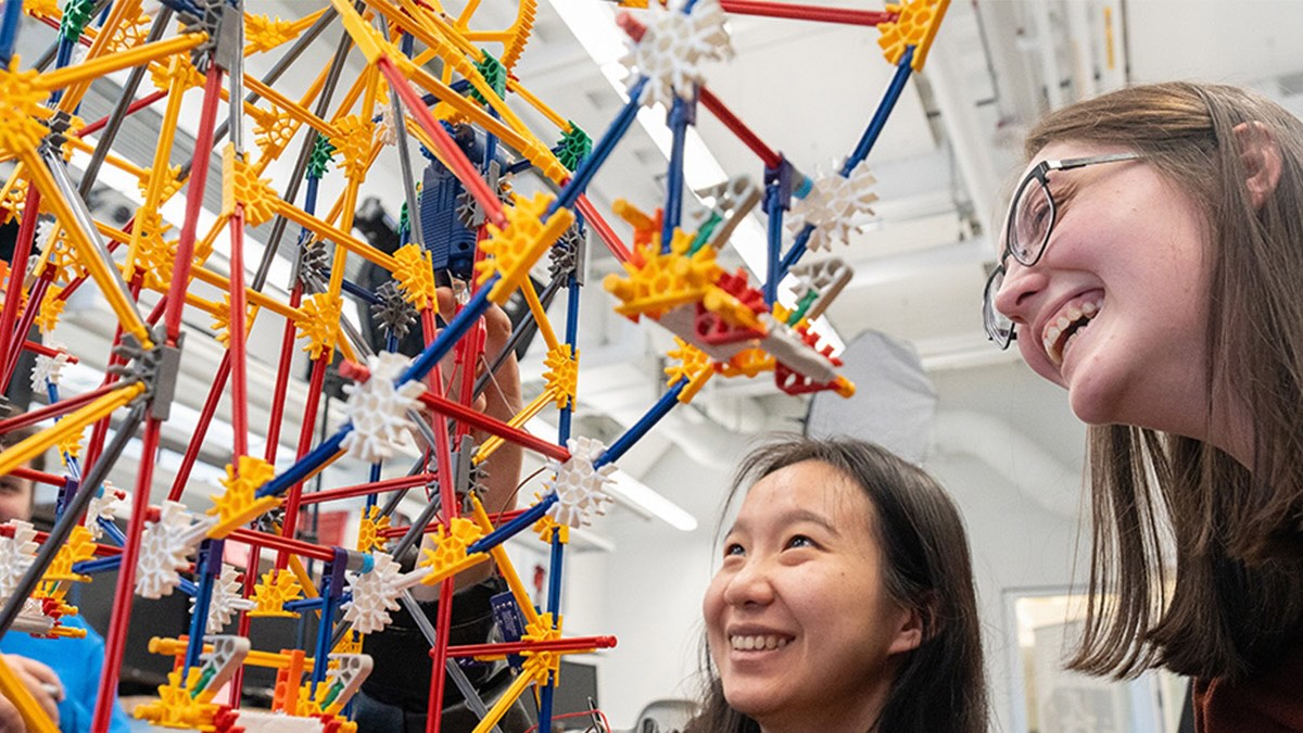Students build a model ferris wheel for use in cybersecurity research