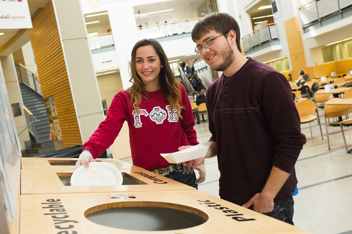 Students recycle and dispose of waste on campus