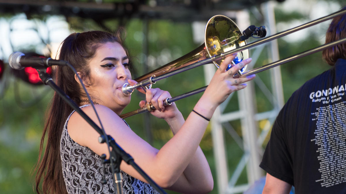Musician playing a trombone at Palousafest