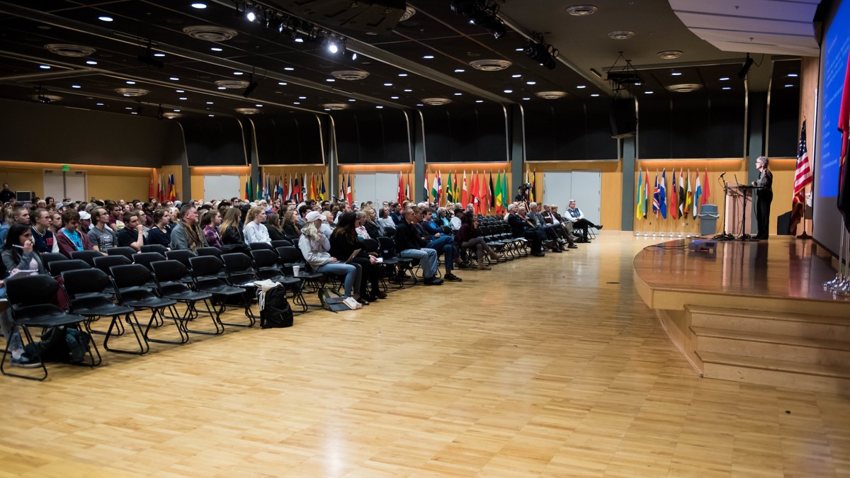 Speaker addresses an audience in the International Ballroom