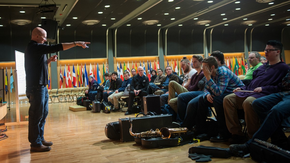 Speaker addresses students at a Jazz Fest workshop held in the International Ballroom