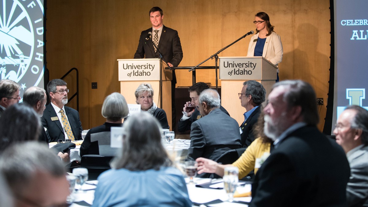 Two presenters address the audience during the U of I Alumni Awards ceremony held in the Vandal Ballroom