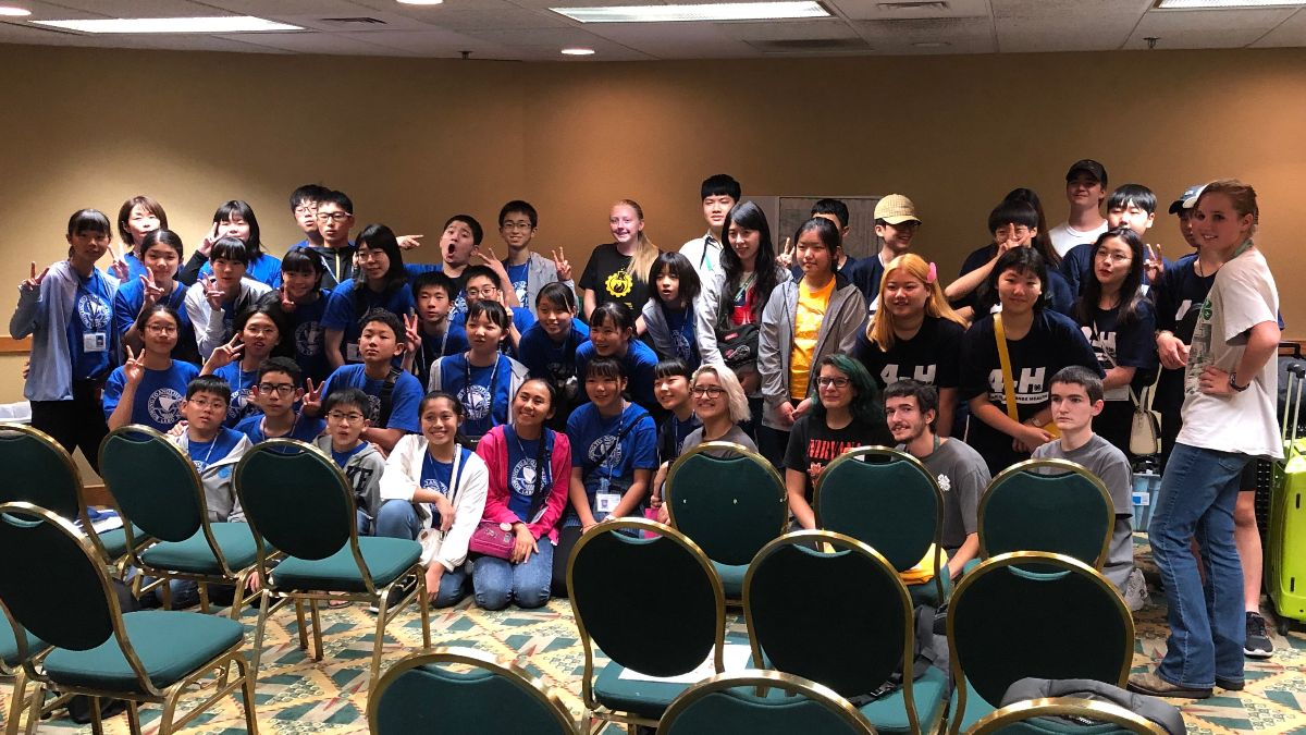 About 45 teens pose together.