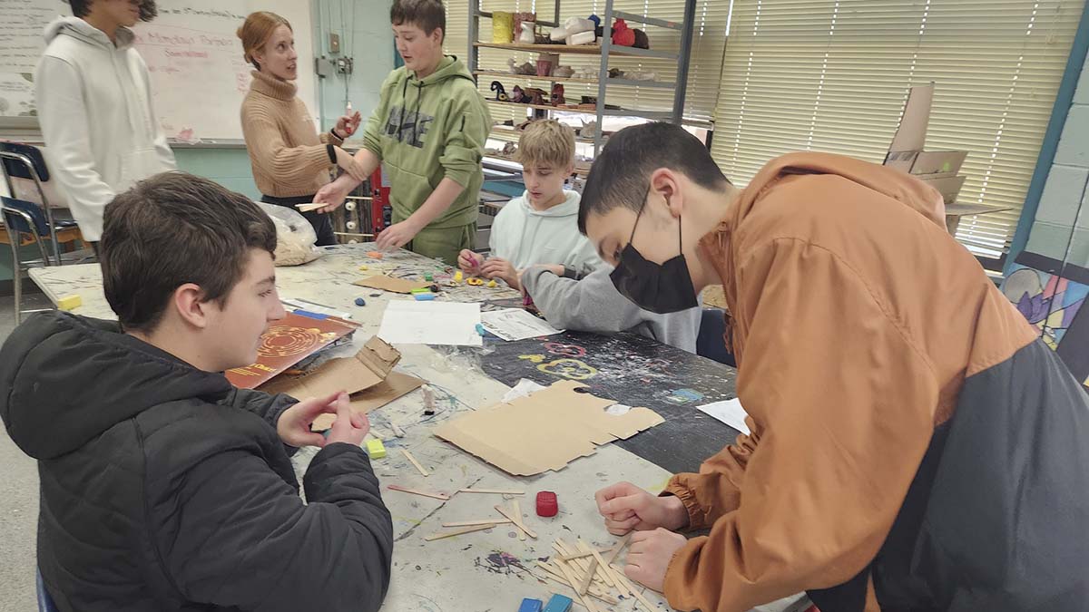 Kids doing crafts at a table