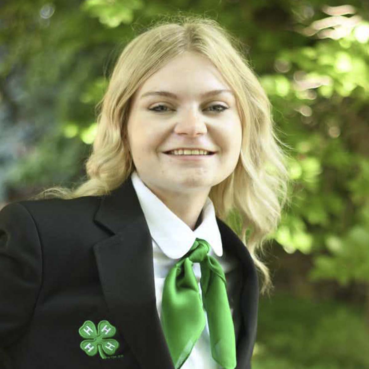 Portrait of a female in 4-H clothing.