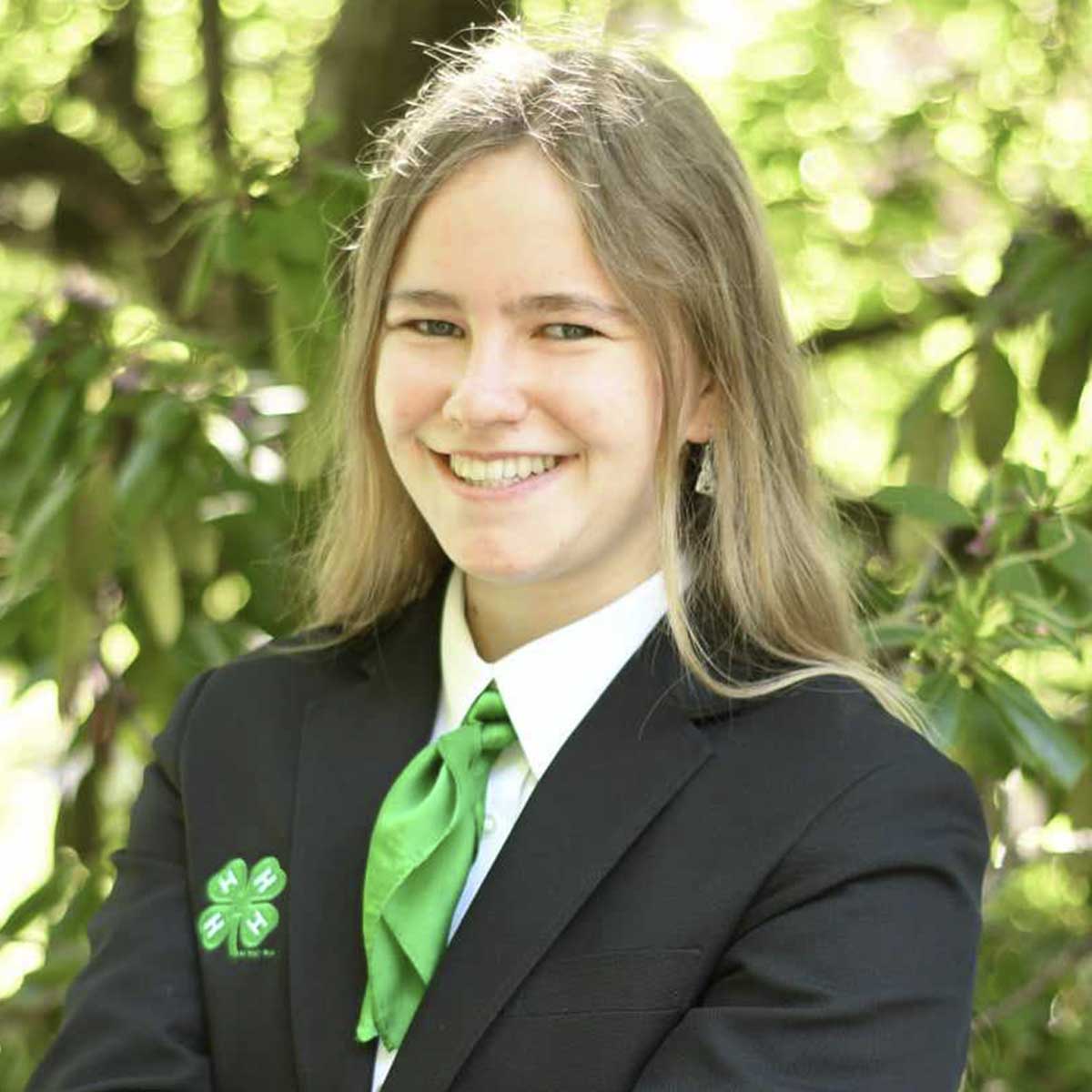 Portrait of a female in 4-H clothing.