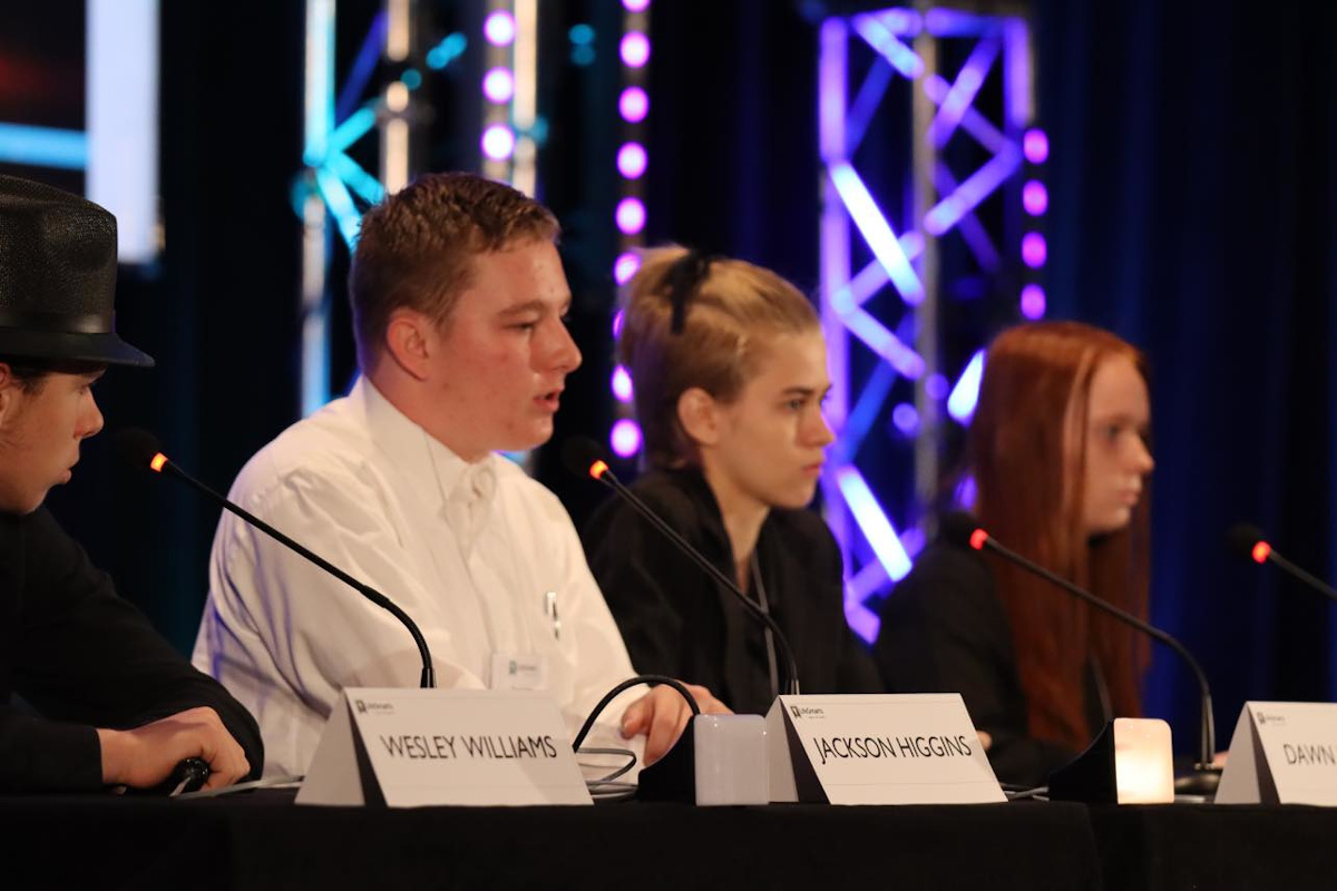 A panel of 4-H youth.