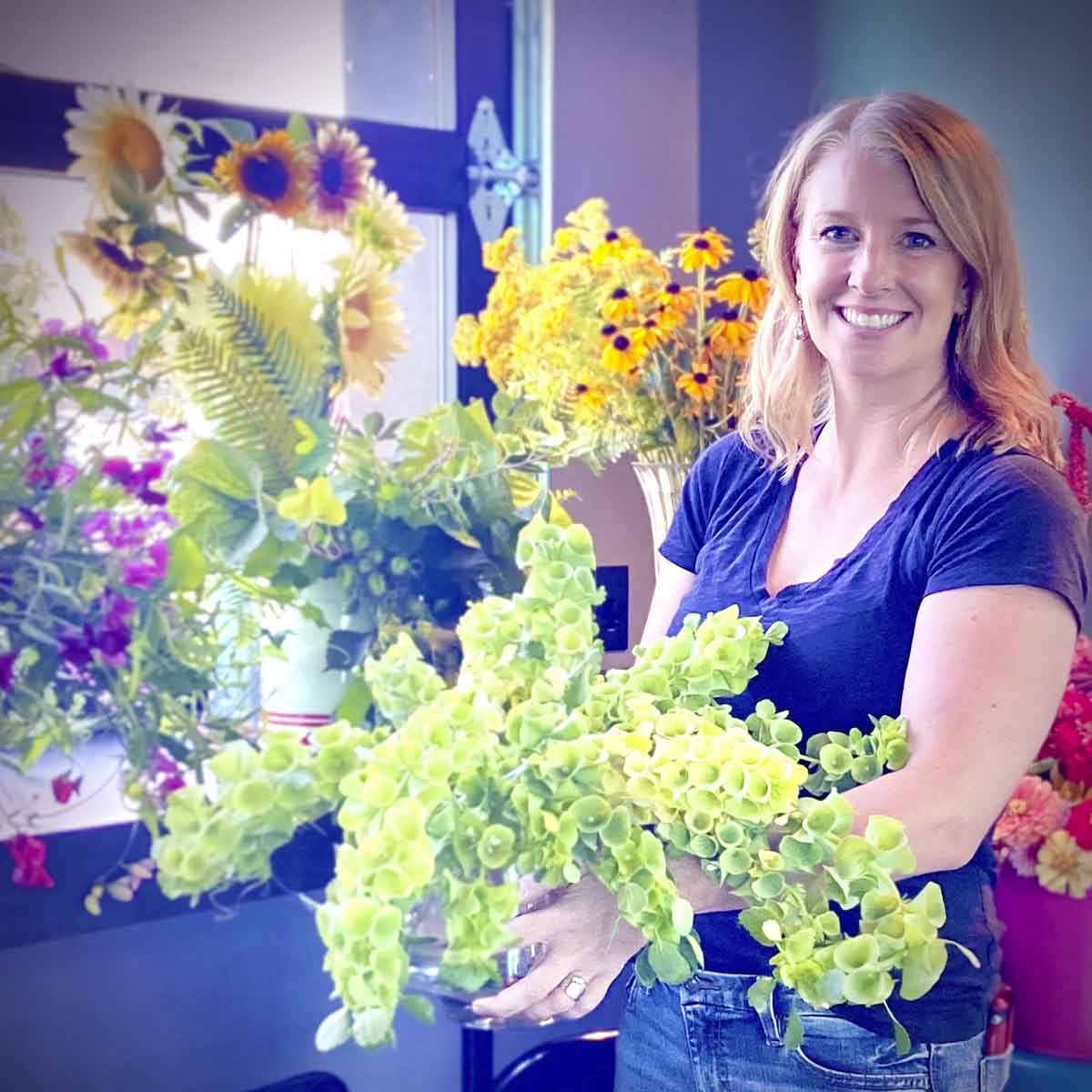 Adele Smith, of Flowersmith Gardens in Boise, holds a bouquet she raised.