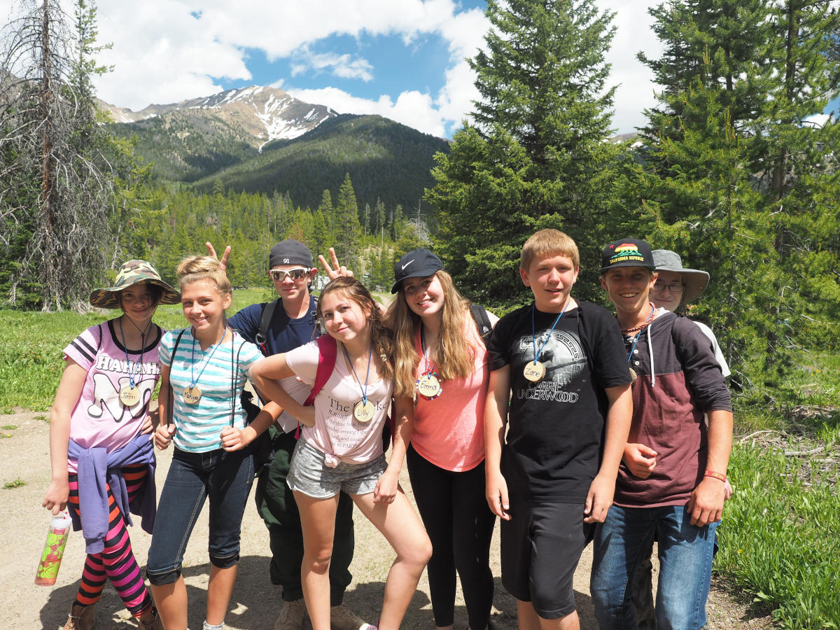Group of smiling camp-goers.