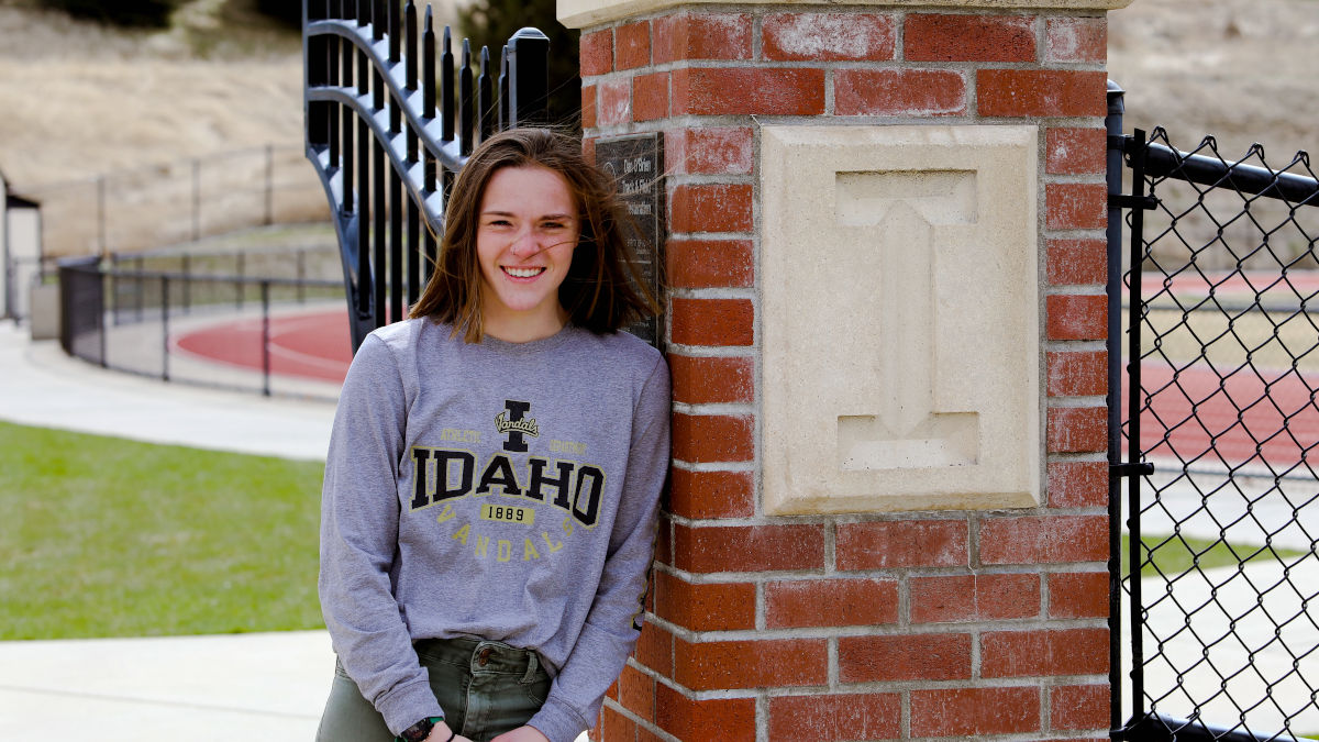 Bec Kirkland standing in front of U of I track.