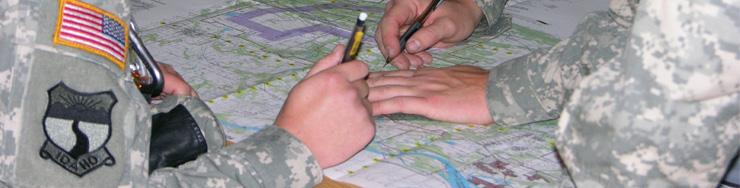 Cadets working with maps Cadets working with maps