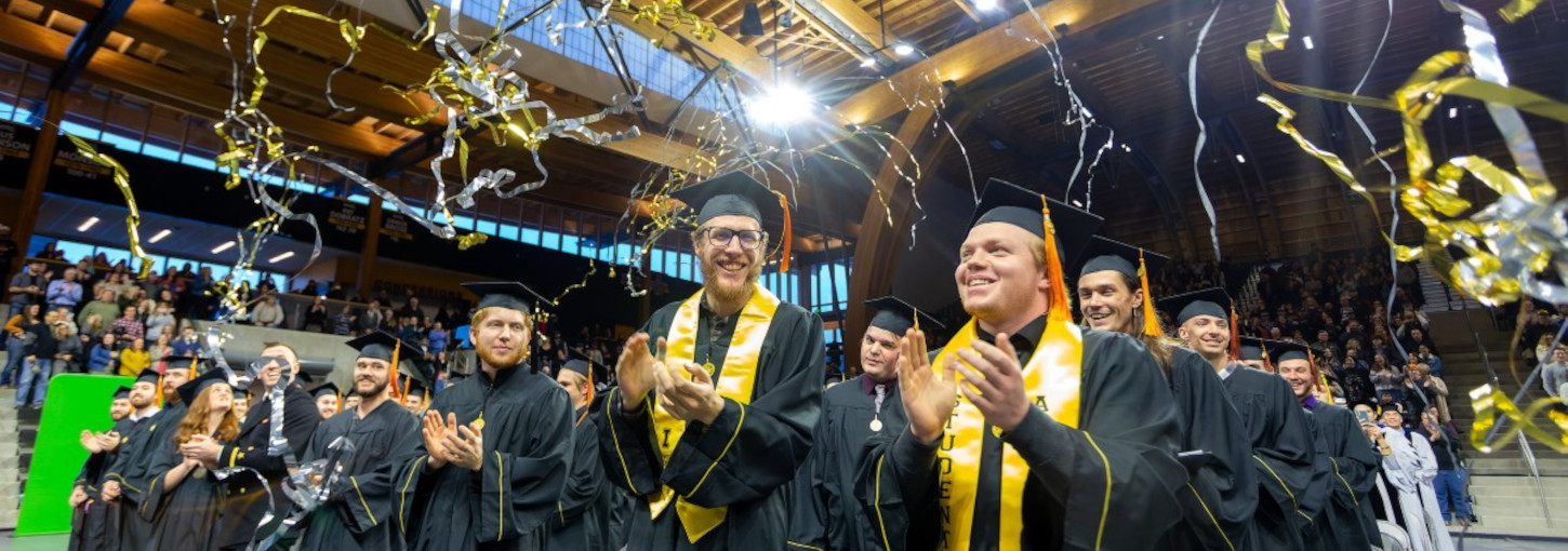 A group of graduations celebrating during Commencement