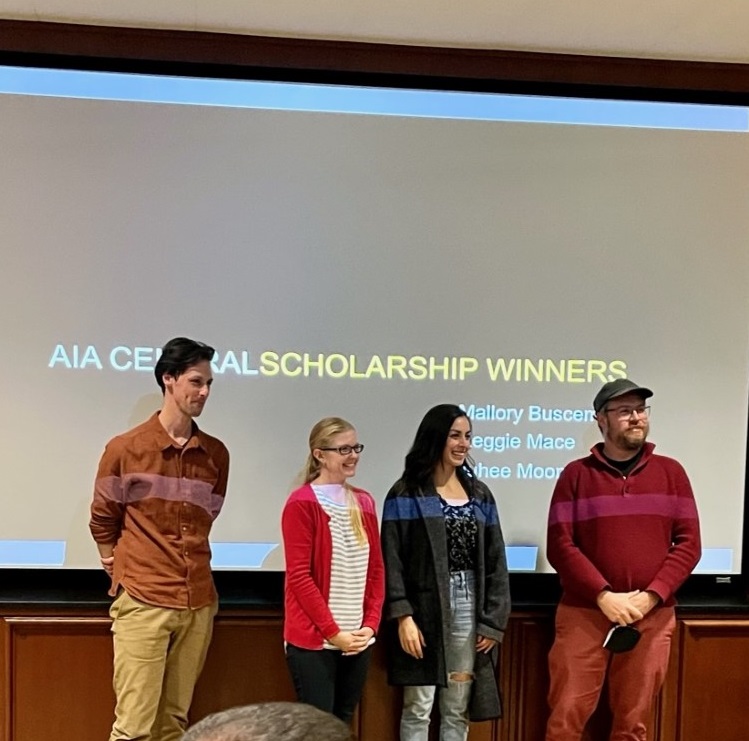 Leah McMillan and Ian Hoffman, of AIA Central Idaho on the left, presenting the scholarships to Mallory Buscemi and Reggie Mace,