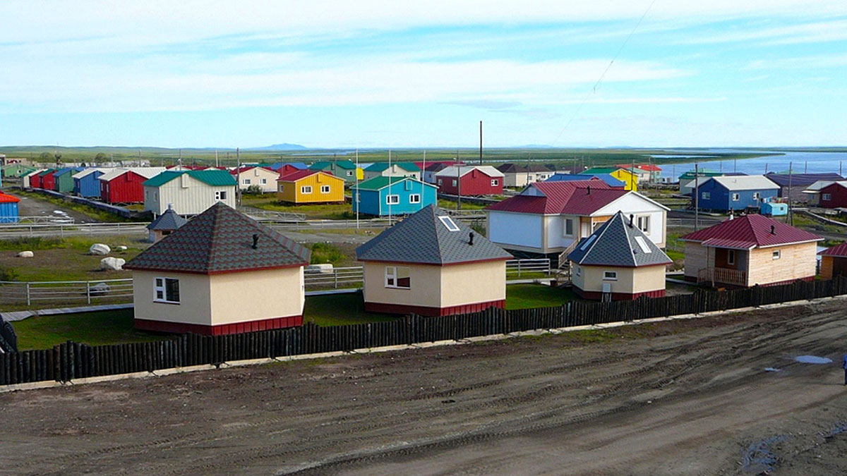 Little houses in a field