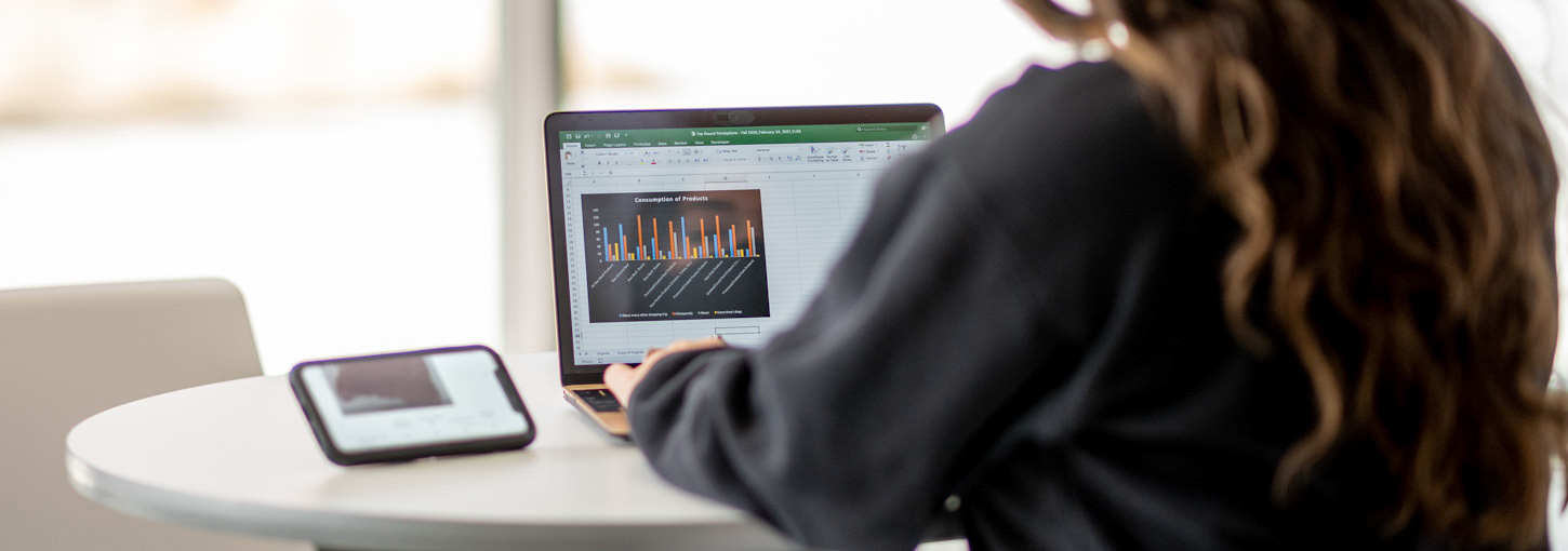 Woman typing on laptop