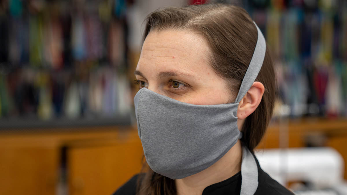 Chelsey Lewallen testing the face mask with knit ties.