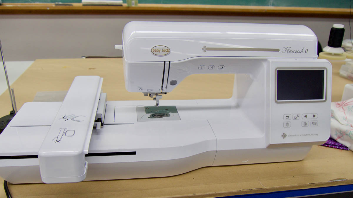 Two embroidery machines and digitizers allow students to create custom embroidery designs on their work. 