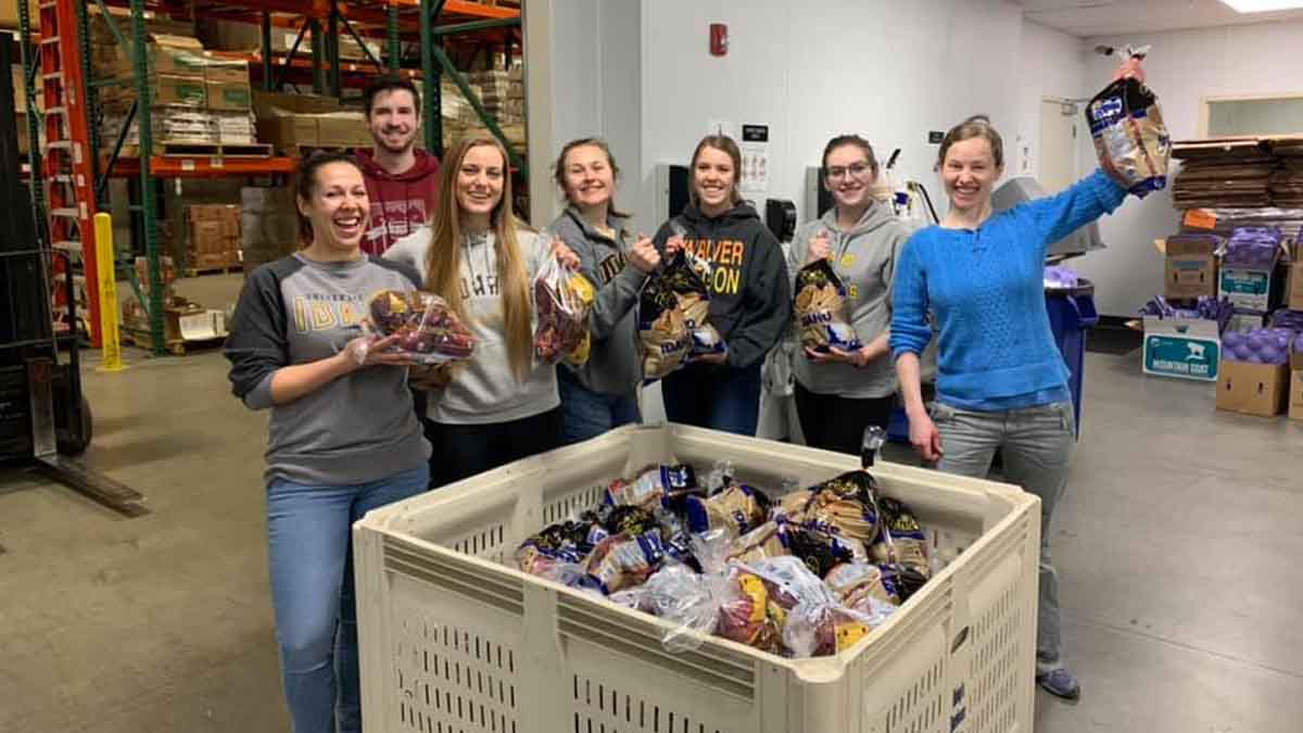 Several students from the AHEC Scholars program volunteered at the Idaho Foodbank in Lewiston, bagging 4,623 pounds of apples for distribution.