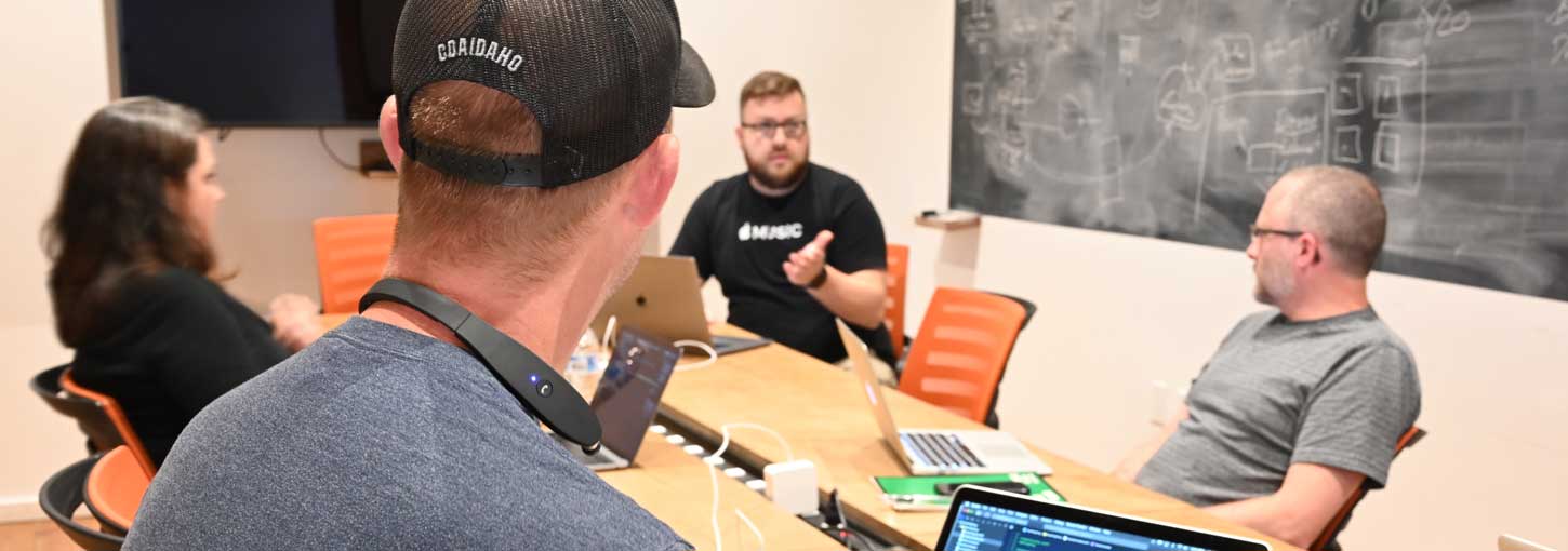 Students meet in a conference room in Coeur d'Alene.