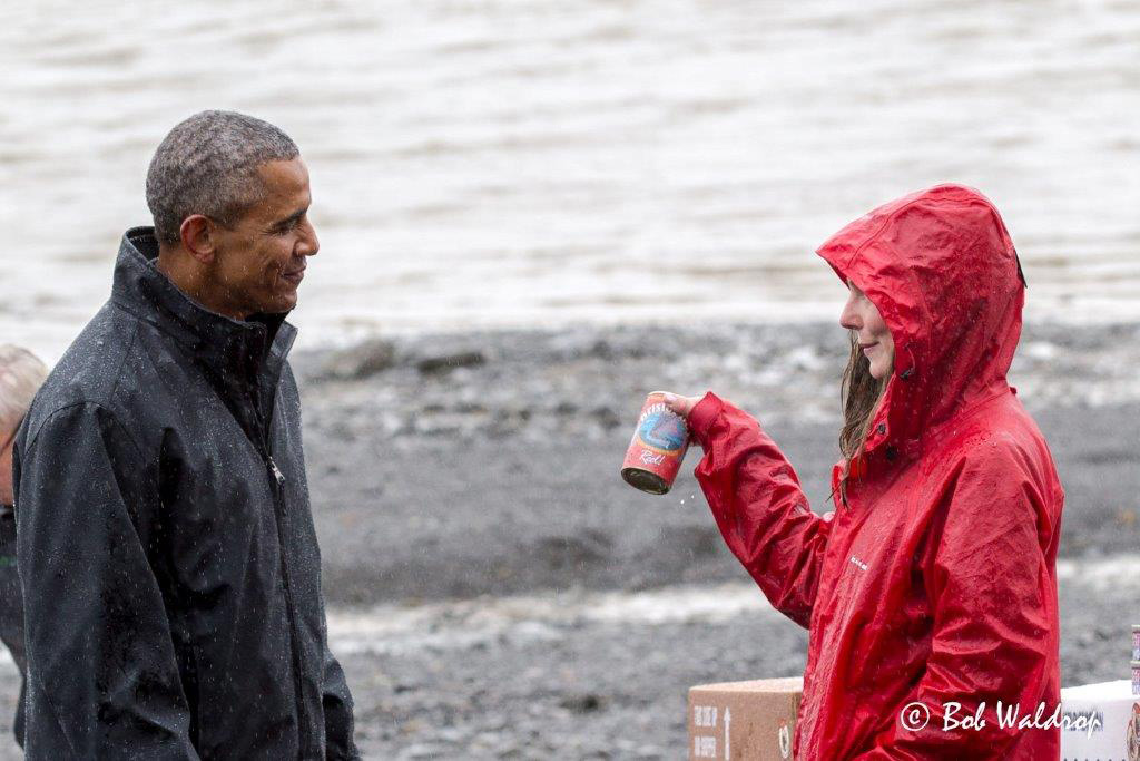 Katherine Carscallen shows President Barrack Obama a can of their fish.