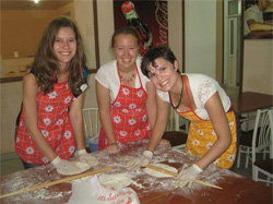 Niki Lee making gutab, a traditional Azerbaijani dish with two friends. 