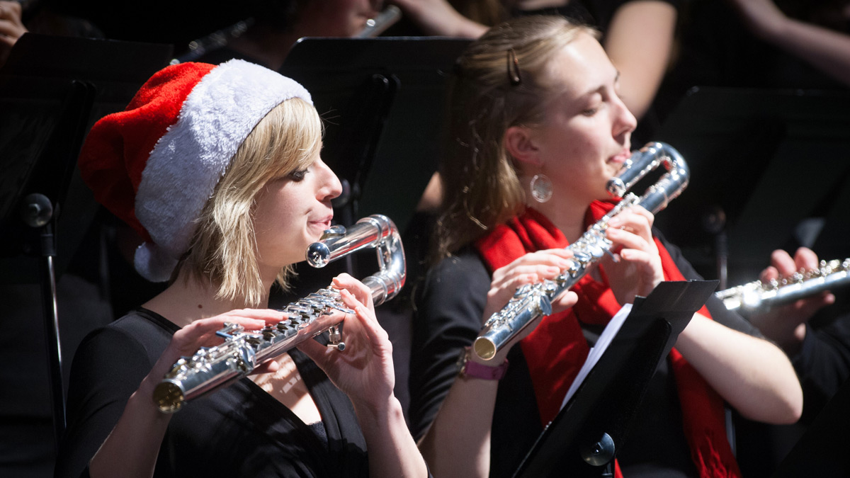 Two students play alto flutes in the 2014 Holiday Concert.