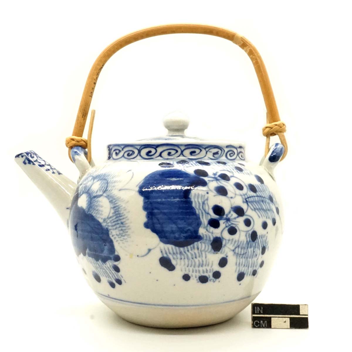 Dobin-style teapot with bamboo handle, Aizu-Hongo ware with sometsuke (hand-painted cobalt) decoration, porcelain.