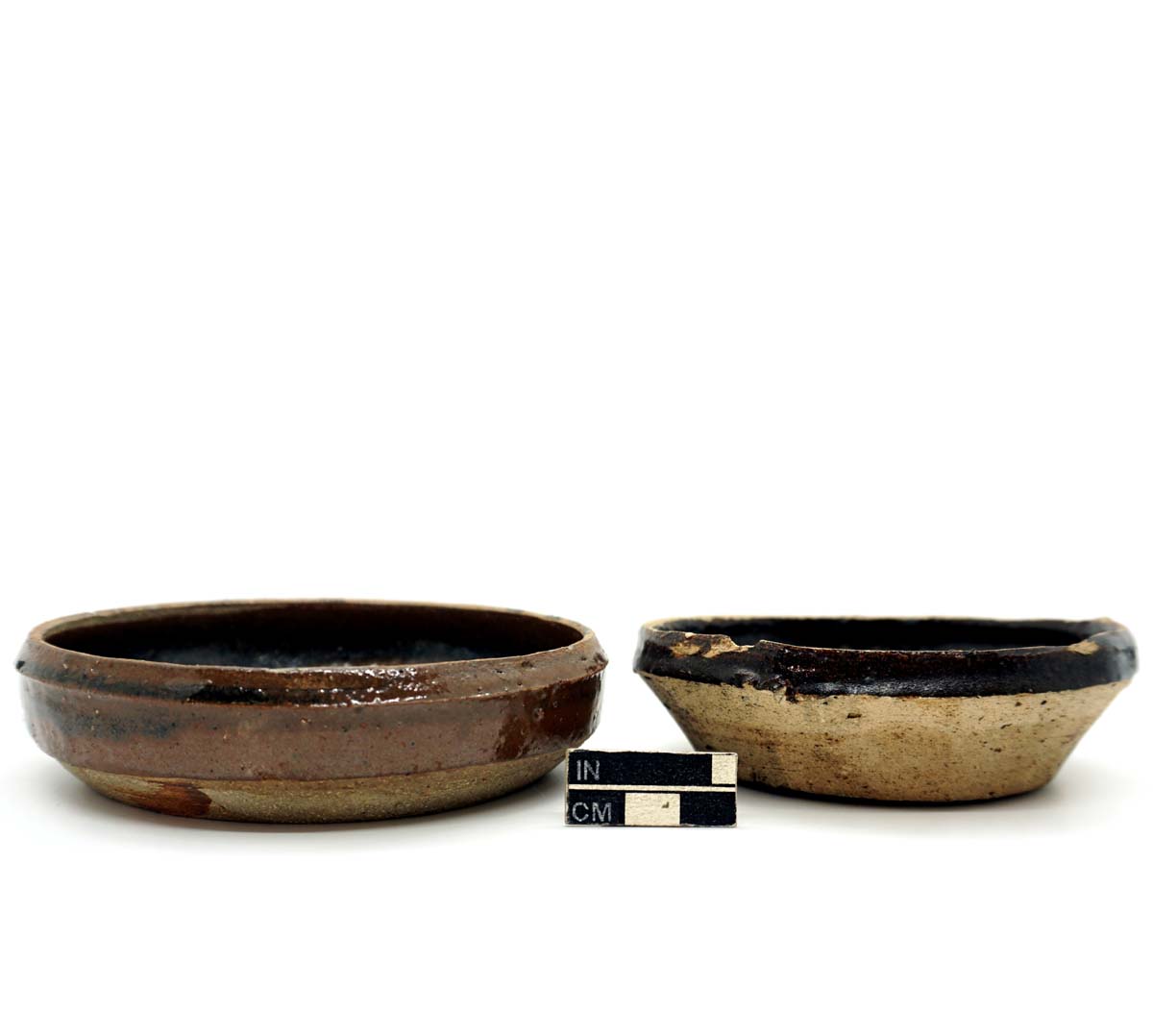 Pans, Chinese brown-glazed stoneware.