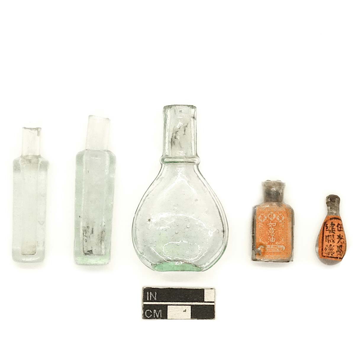 Chinese medicine bottles, aqua and colorless glass