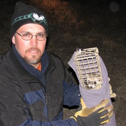 shaun grassel with captured black footed ferret