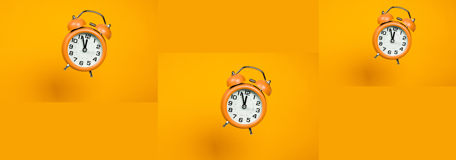Alarm clock, orange background