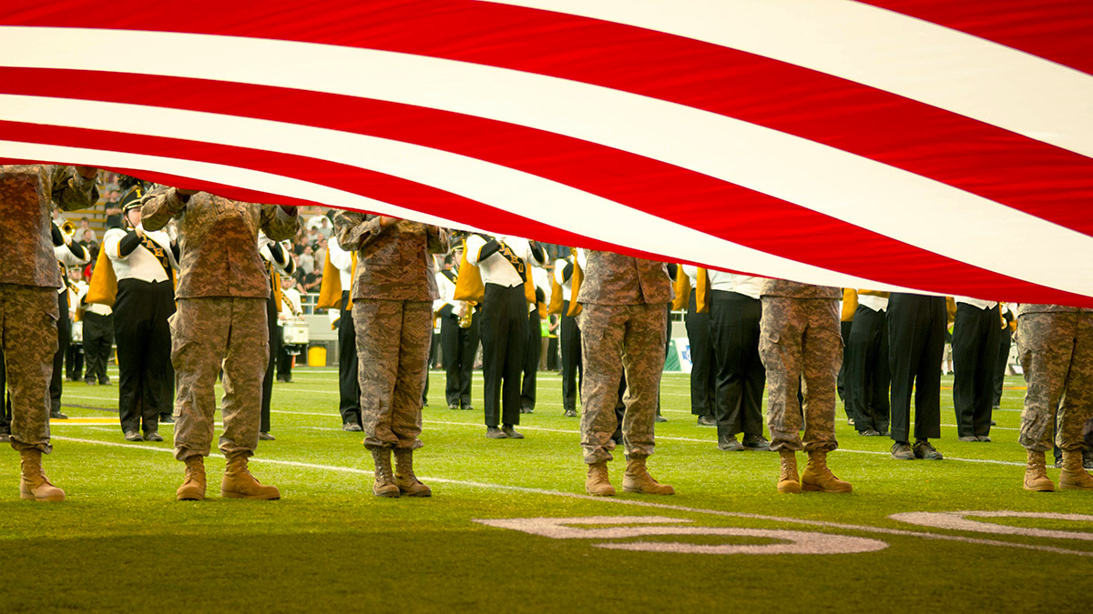 military formation with US flag