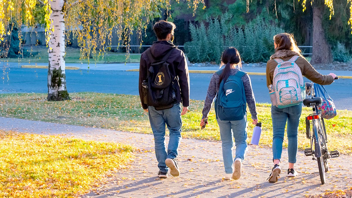 people walking on campus