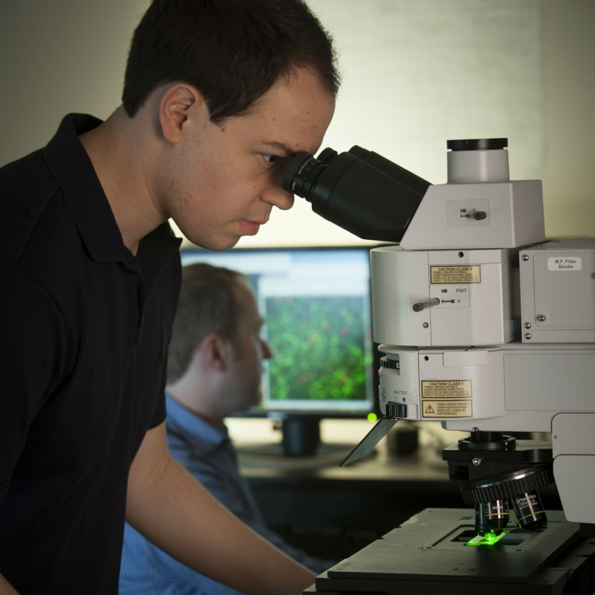 photo of customers using Olympus Laser Scanning Confocal Microscope