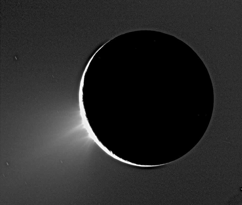 Enceladus back-lit by the sun.