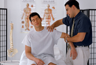 A doctor examining a patient.