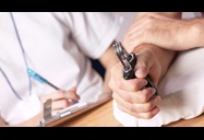 A occupational therapist consulting with a patient.