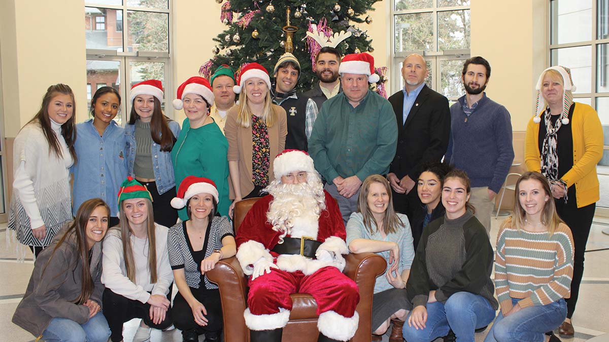 Interns and staff at Free Photos with Santa