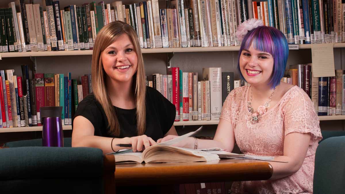 Students in the Women's Center library Students in the Women's Center library