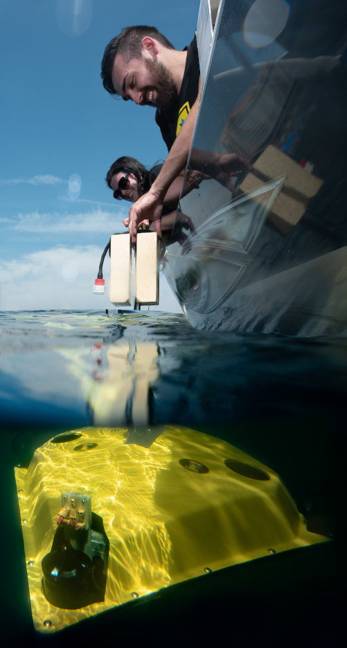 Computer Sciences students and faculty gather on Coeur d'Alene Lake to deploy the catfish submarine
