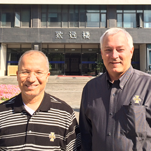 Chair Mohsen Guizani and Dean Learry Stauffer at Wenzheng College