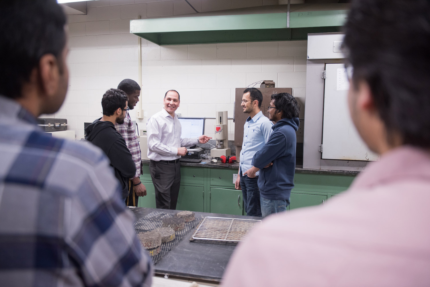 Emad with students