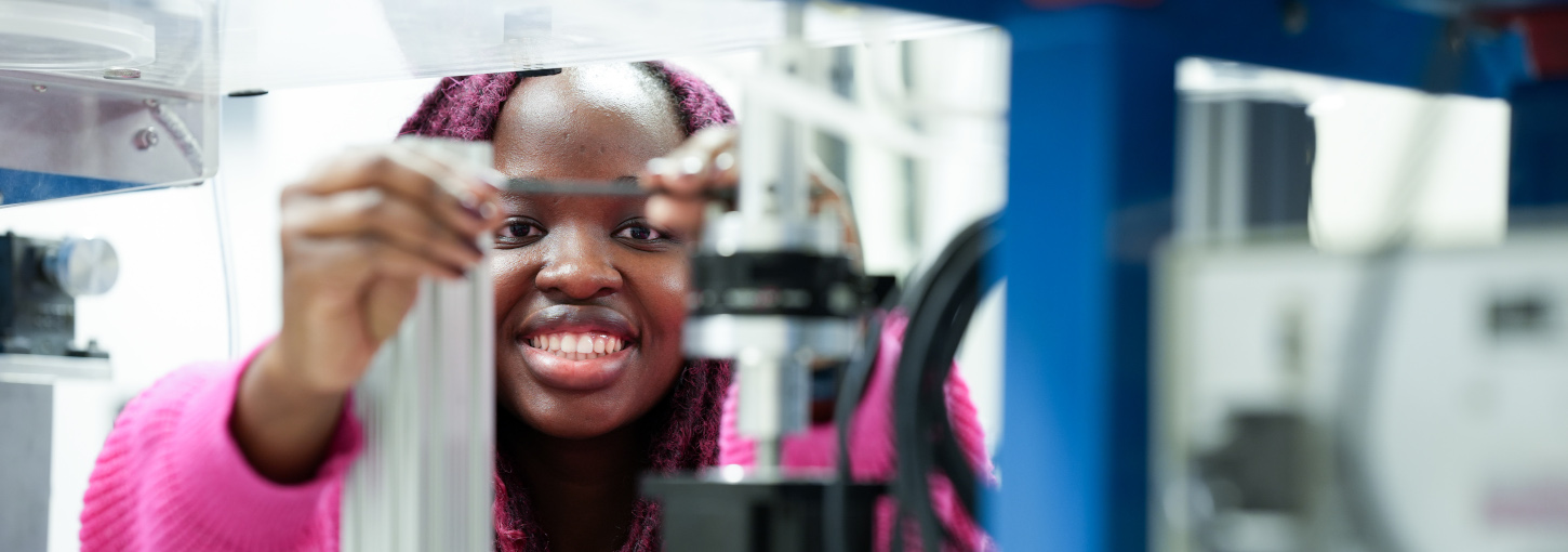 Shalom Masango adjusts a wind tunnel component