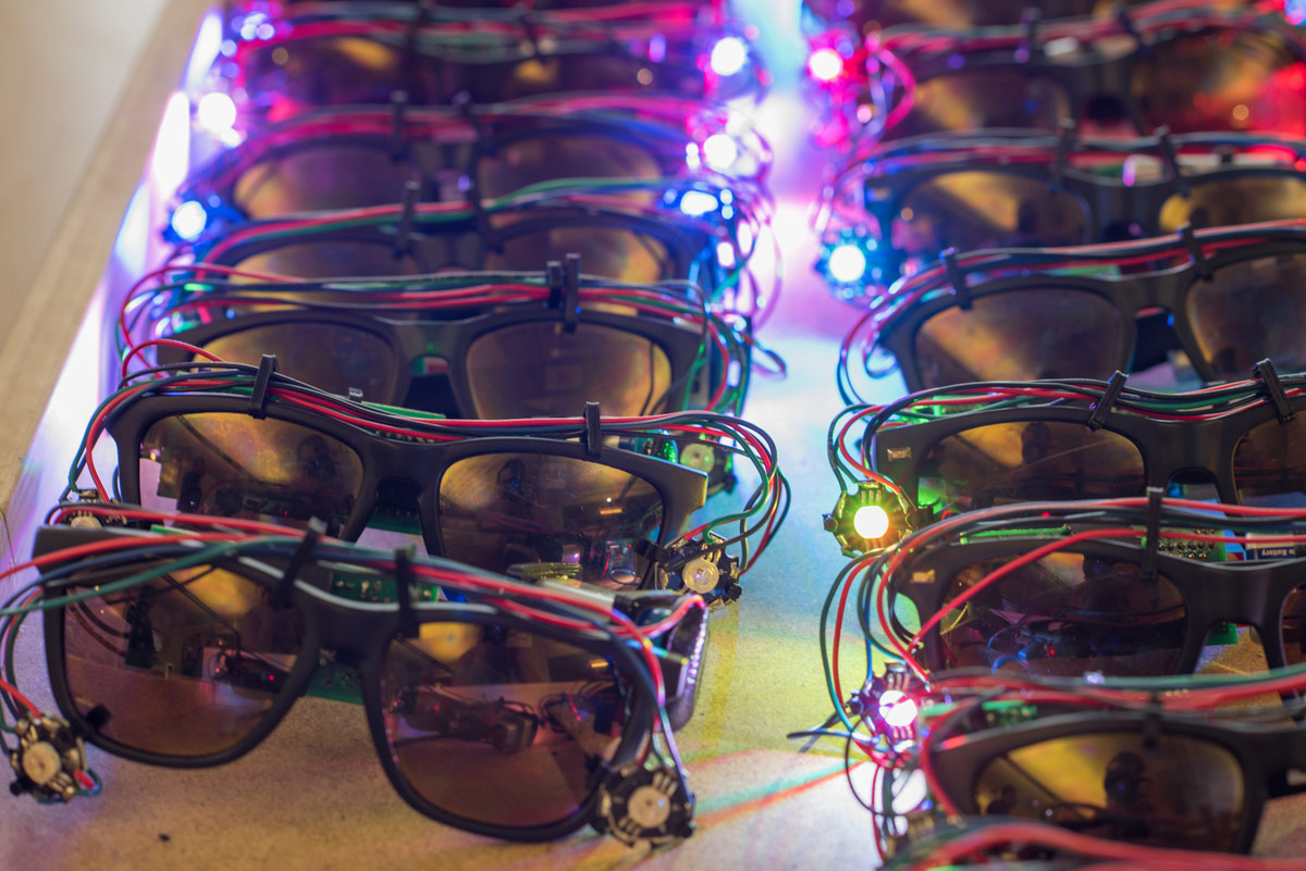 Sunglasses affixed with lights and wiring