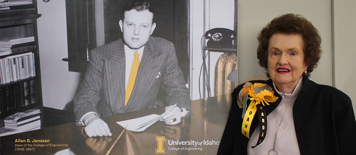 Sheila Janssen-Klages poses with a photo of her father, Allen S. Janssen, former dean of the College of Engineering from 1946 to 1967.
