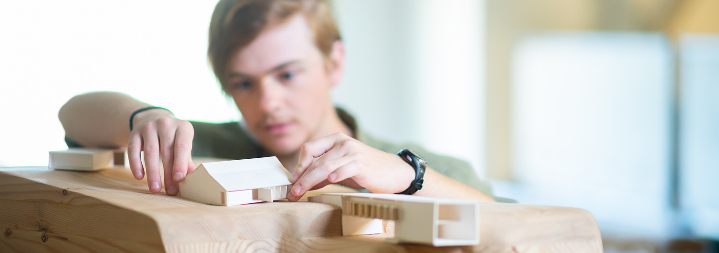 Mars Cantrell placing model houses.