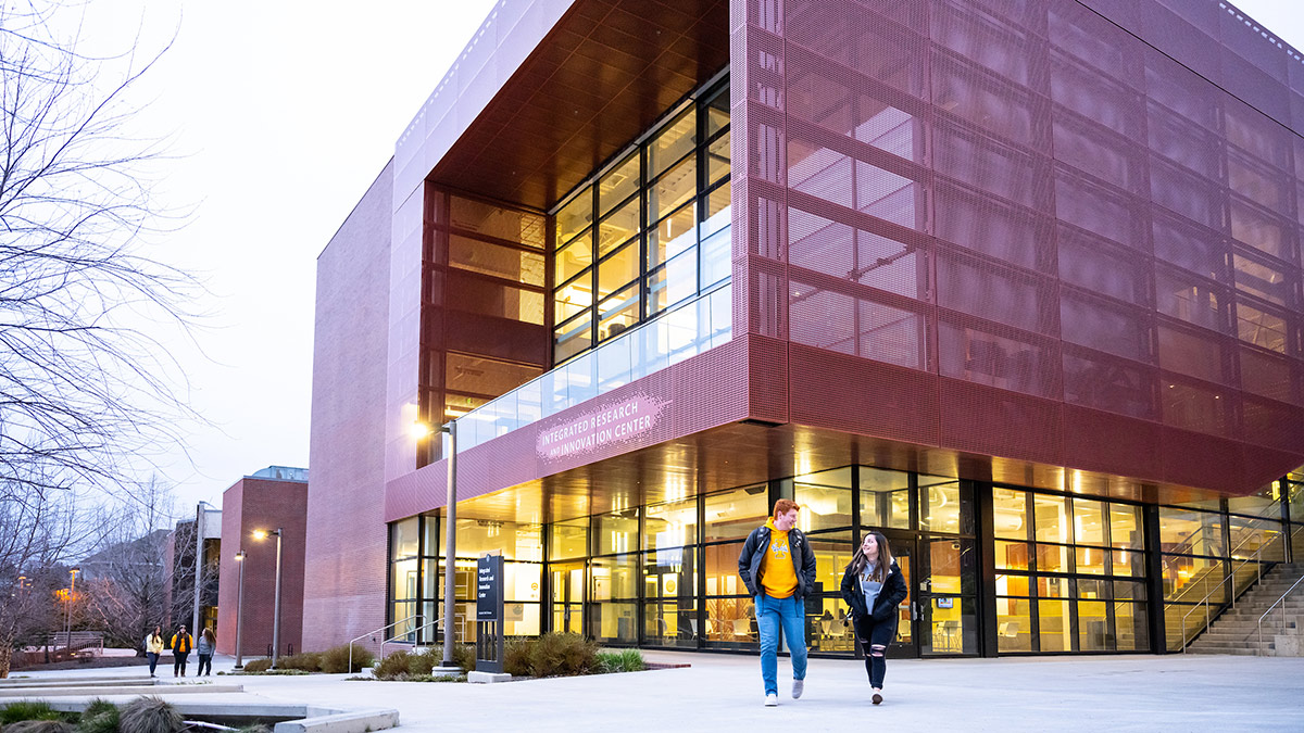 Students walk outside of the IRIC.